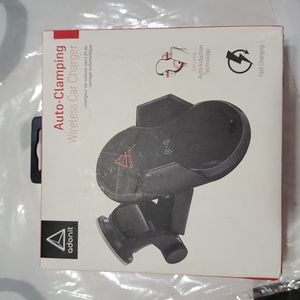 Auto clamping wireless car charger